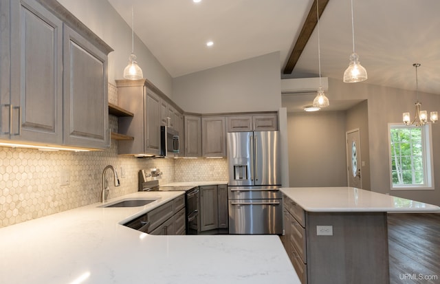 kitchen with dark hardwood / wood-style floors, stainless steel appliances, vaulted ceiling with beams, backsplash, and sink