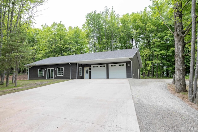 ranch-style house featuring a garage