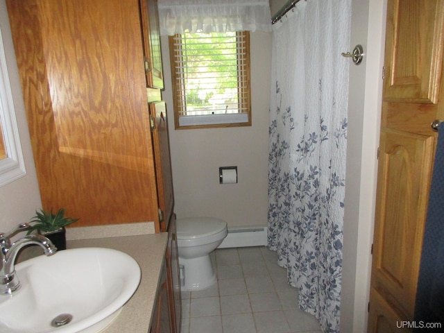 bathroom with toilet, walk in shower, tile patterned floors, vanity, and a baseboard radiator