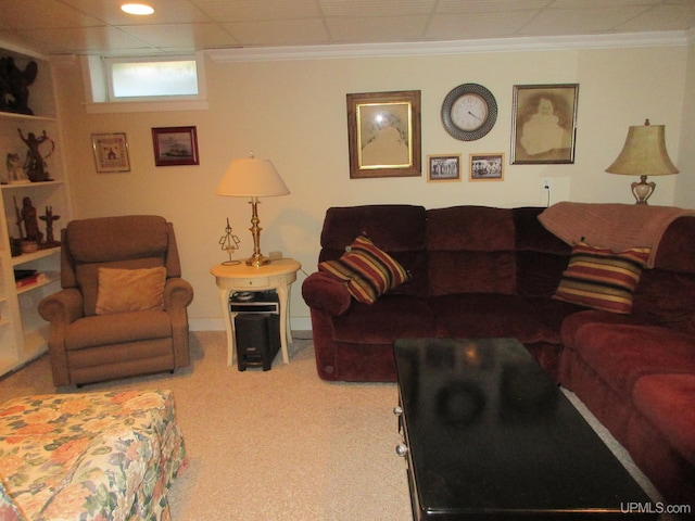 living room with crown molding and carpet