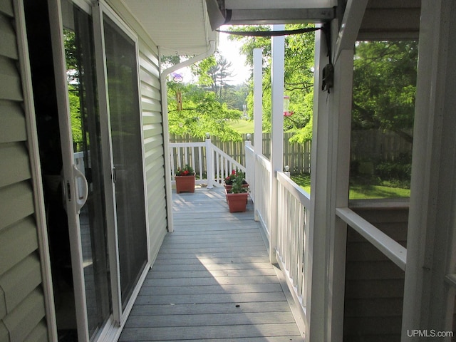 wooden terrace featuring a porch