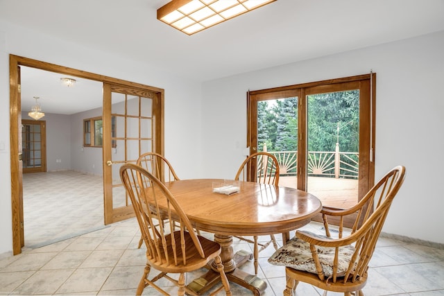 tiled dining space with french doors