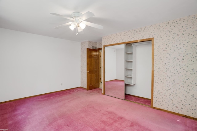 unfurnished bedroom featuring ceiling fan, a closet, and carpet floors