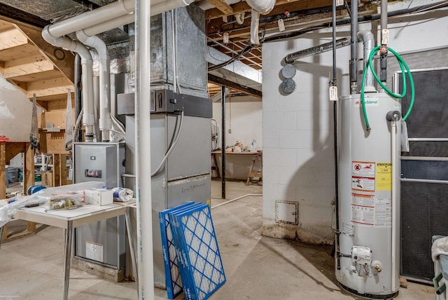 utility room featuring water heater