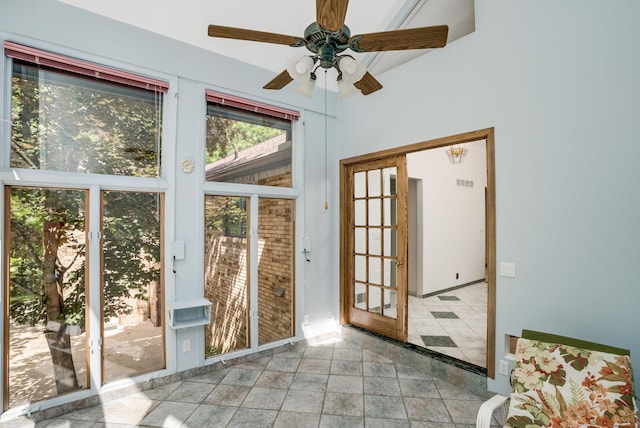 entryway featuring french doors and ceiling fan