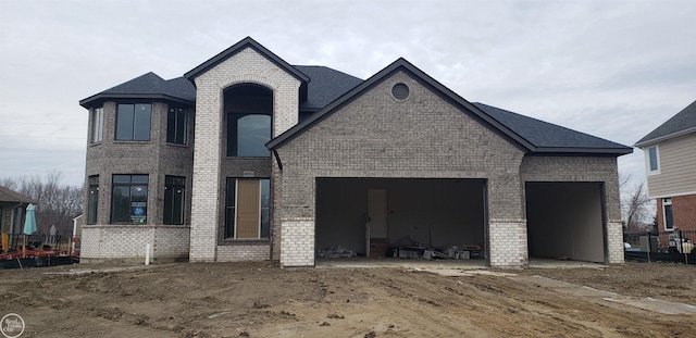 view of front of property with a garage