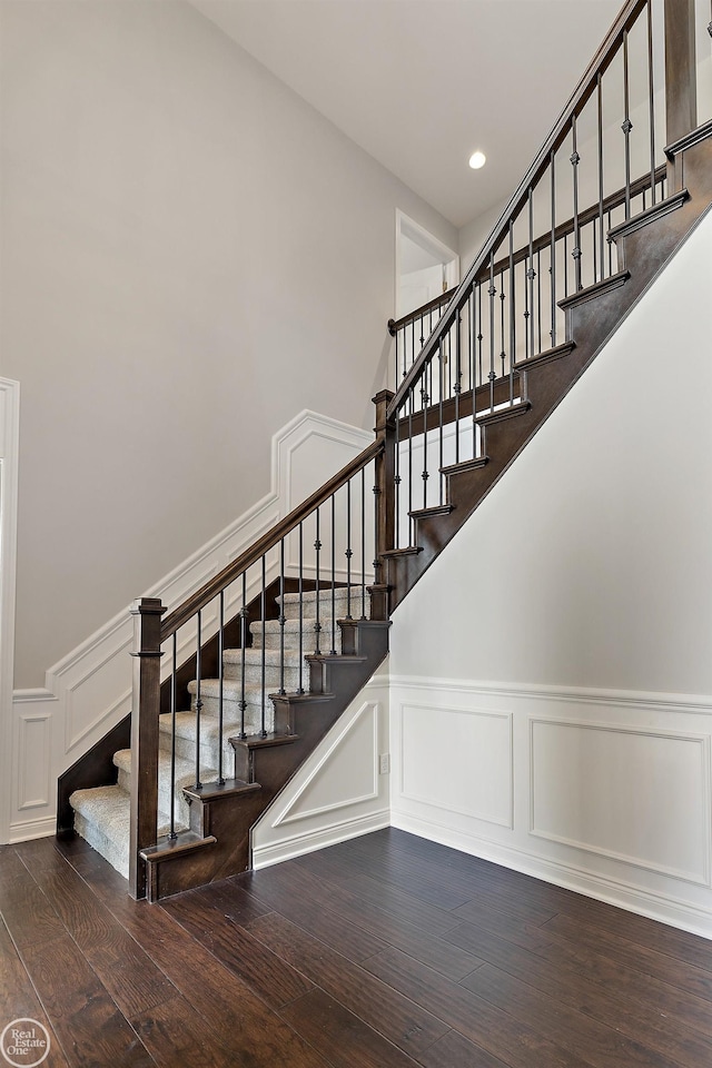 stairway with wood-type flooring