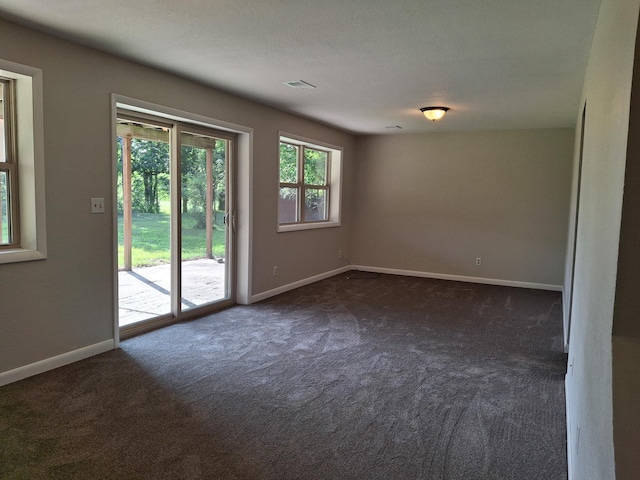 view of carpeted spare room