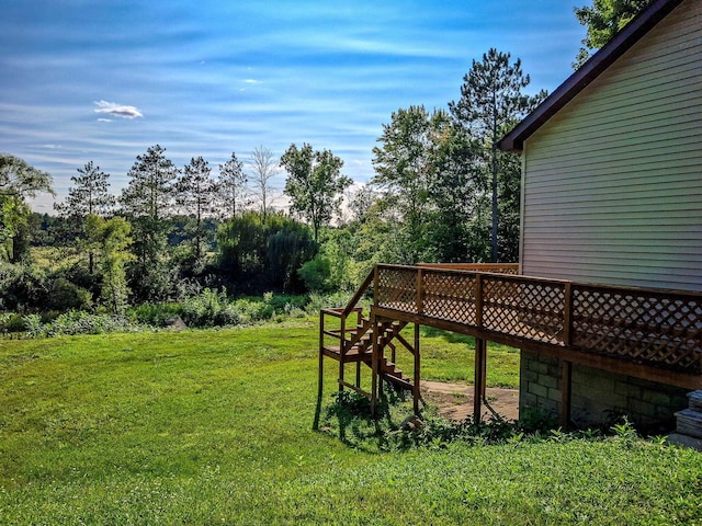 view of yard with a wooden deck