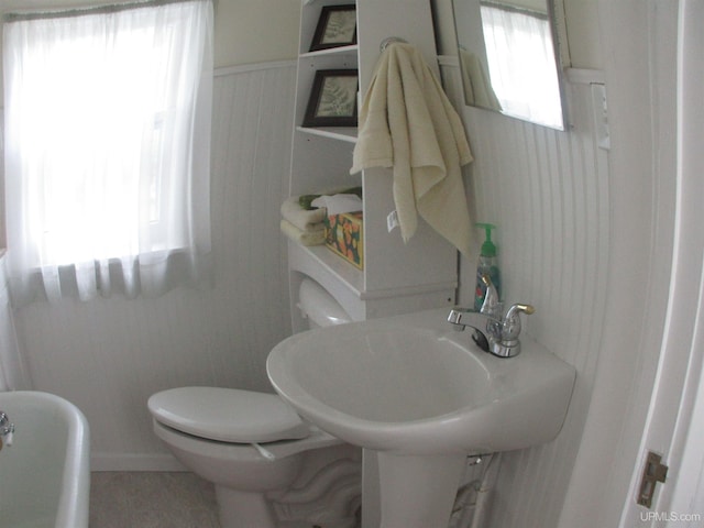 bathroom featuring toilet