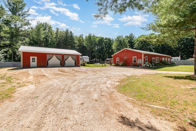 garage with a yard