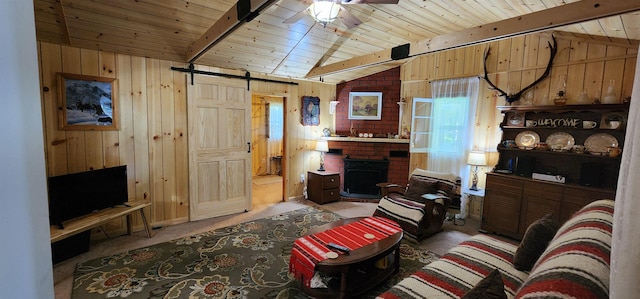 carpeted living room featuring vaulted ceiling with beams, wood walls, ceiling fan, and wood ceiling