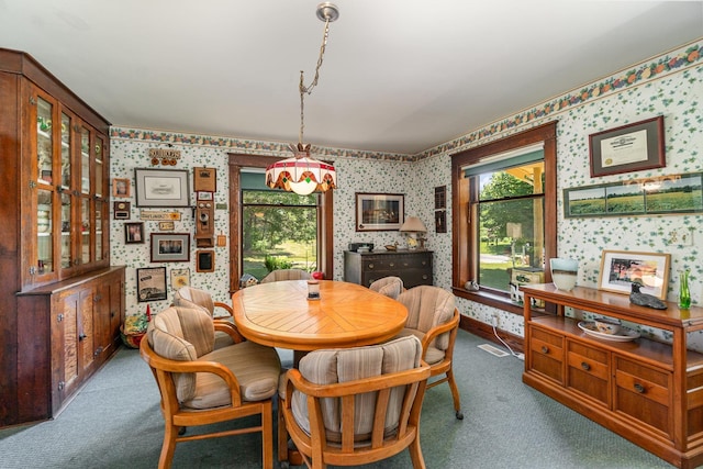 view of carpeted dining room