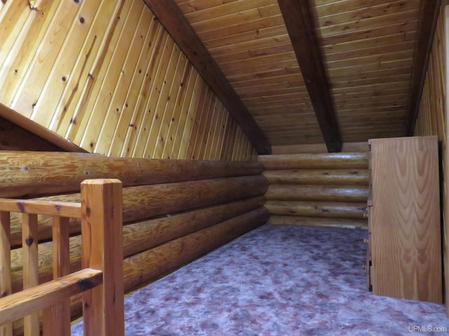 bonus room with beamed ceiling, carpet, rustic walls, and wooden ceiling