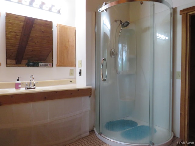 bathroom with tile patterned floors, vaulted ceiling with beams, wooden ceiling, sink, and a shower with door