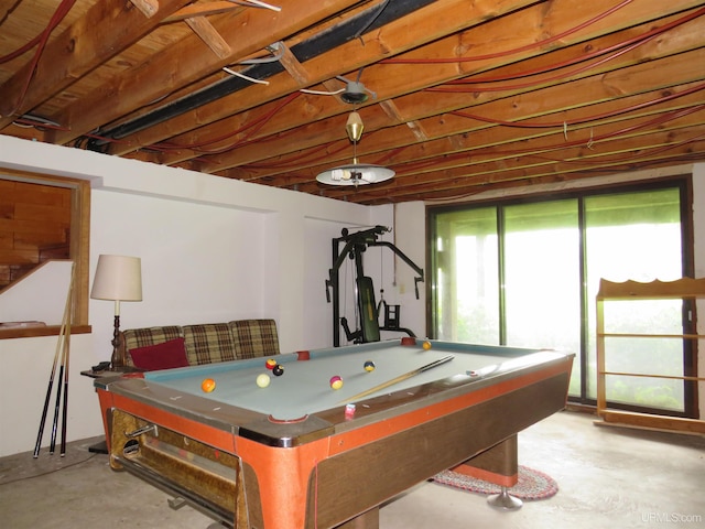 playroom featuring concrete flooring and billiards