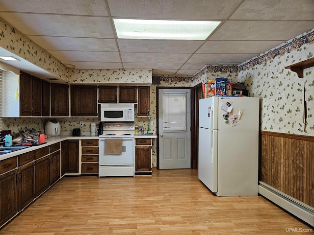 kitchen with a baseboard heating unit, light hardwood / wood-style floors, white appliances, and a paneled ceiling