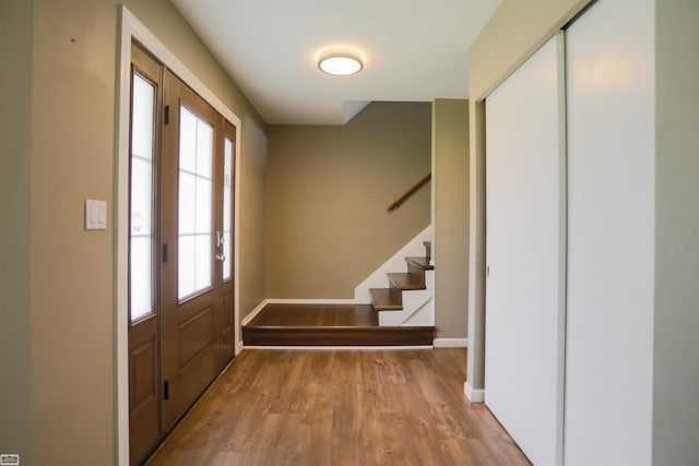 foyer entrance with hardwood / wood-style floors