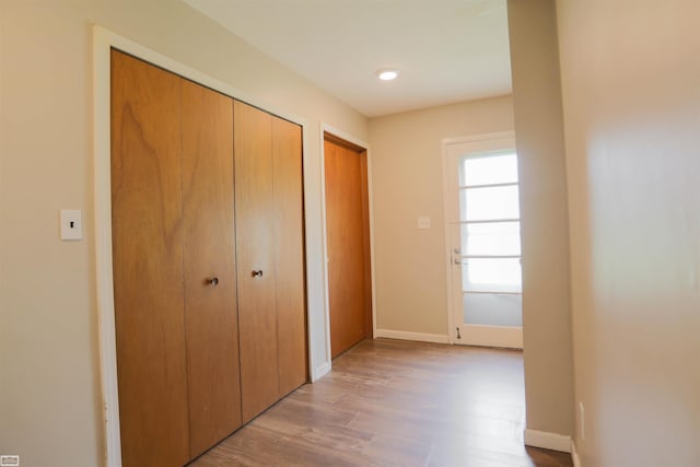 unfurnished bedroom with hardwood / wood-style floors