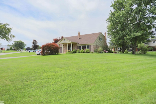 exterior space with a front yard