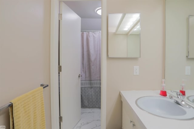 bathroom featuring vanity and tile patterned flooring