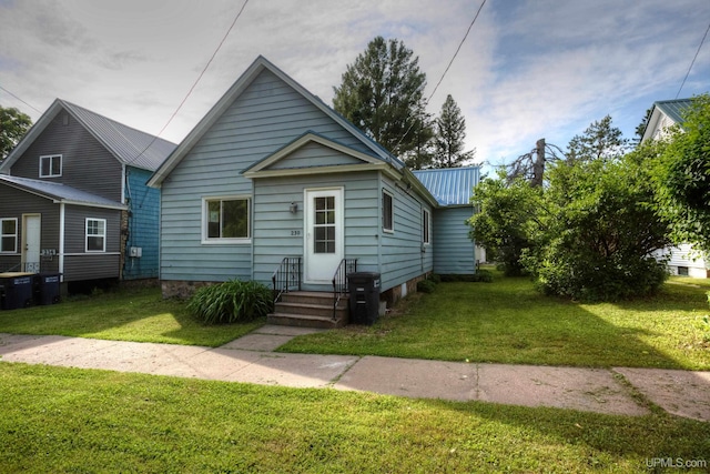 bungalow with a front lawn