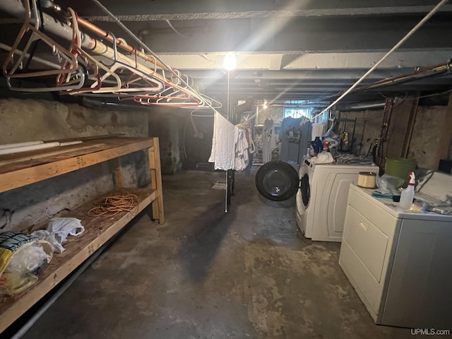 basement with separate washer and dryer