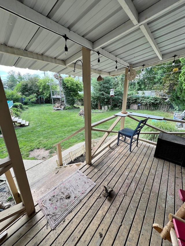 wooden deck with a yard