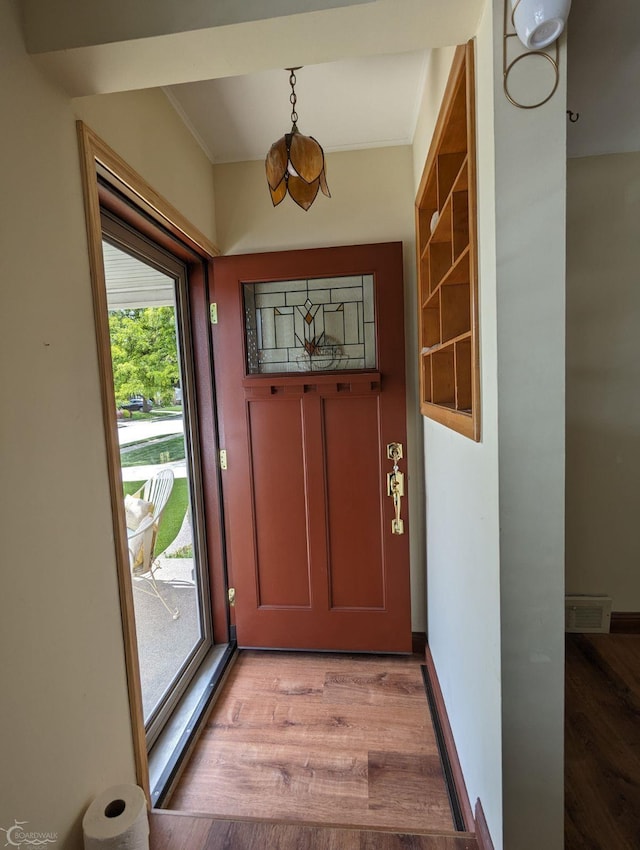 doorway to outside featuring light hardwood / wood-style floors