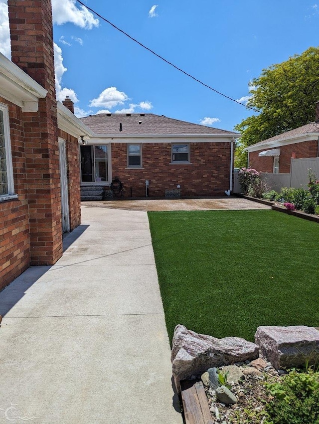 view of yard with a patio area