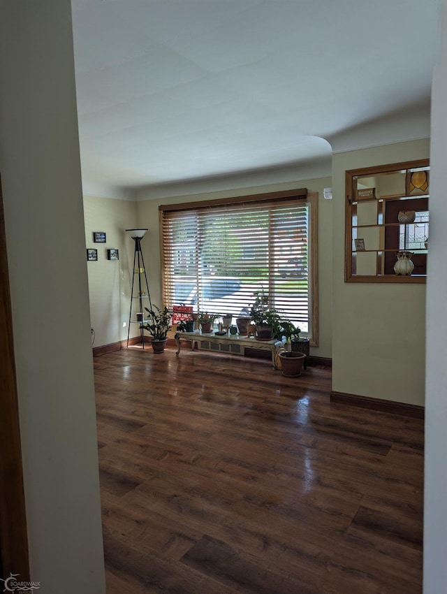 dining area featuring dark hardwood / wood-style floors