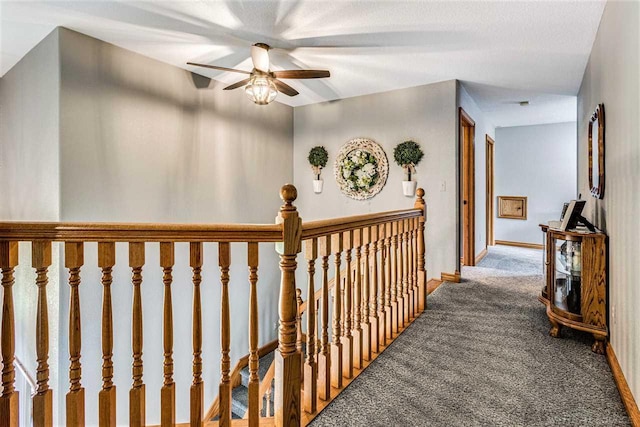 hallway with dark carpet