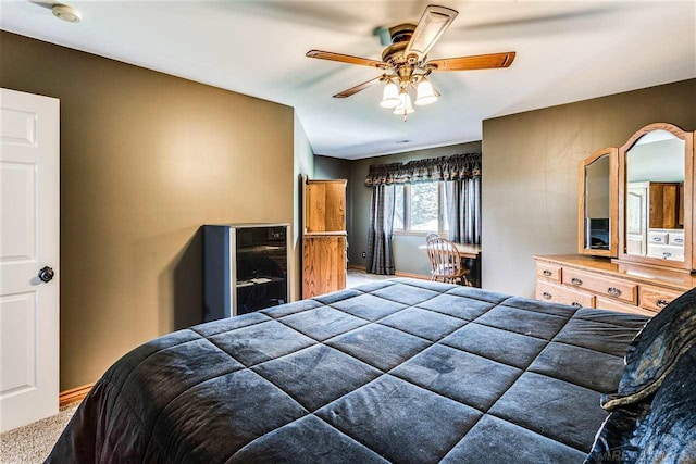 bedroom featuring ceiling fan