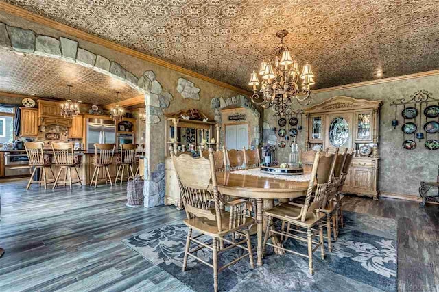 dining area featuring arched walkways, dark wood finished floors, an ornate ceiling, ornamental molding, and a notable chandelier