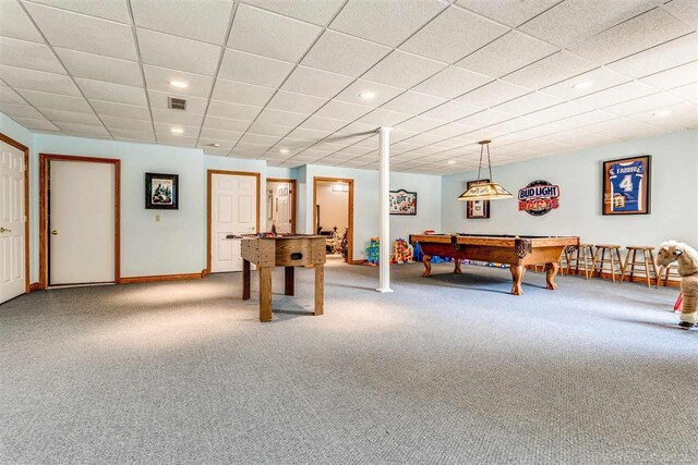 game room with a paneled ceiling, carpet flooring, and billiards