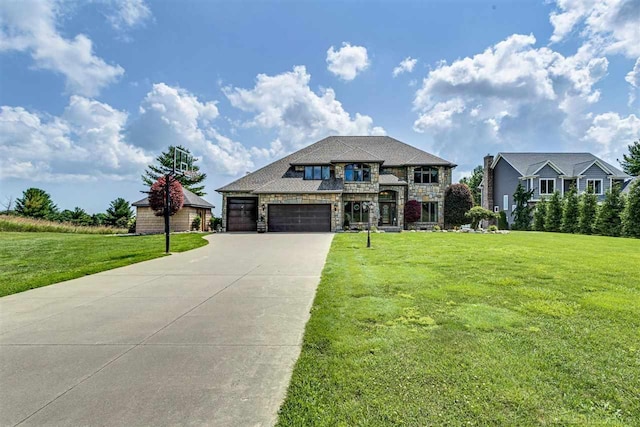 view of front facade with an attached garage, stone siding, a front lawn, and concrete driveway