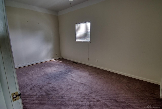 view of carpeted spare room