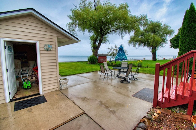 view of patio / terrace featuring a water view