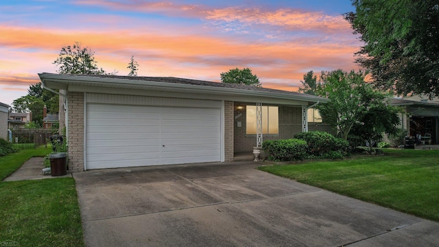 single story home featuring a yard