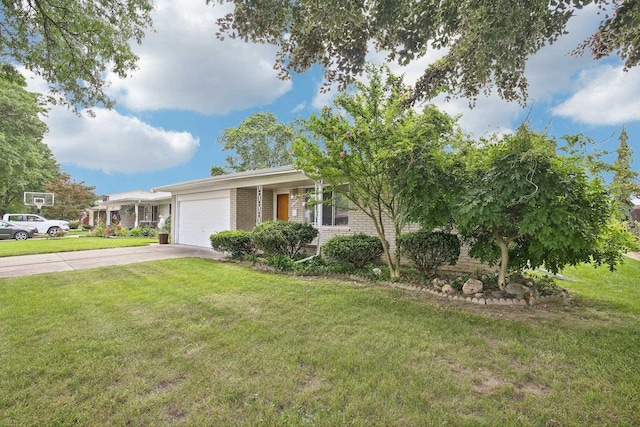 single story home featuring a front yard and a garage