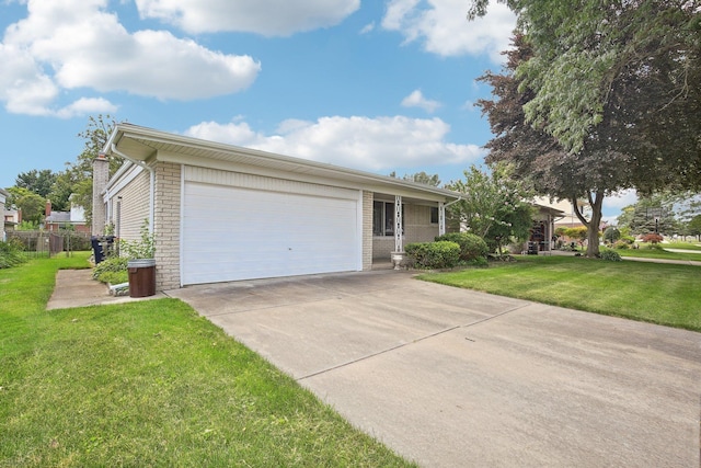 single story home featuring a front yard and a garage