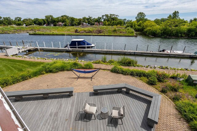 dock area with a water view