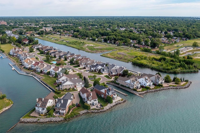 aerial view featuring a water view and a residential view