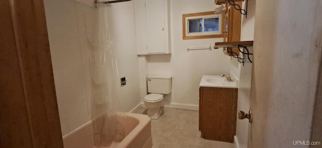 bathroom featuring a tub to relax in, vanity, and toilet