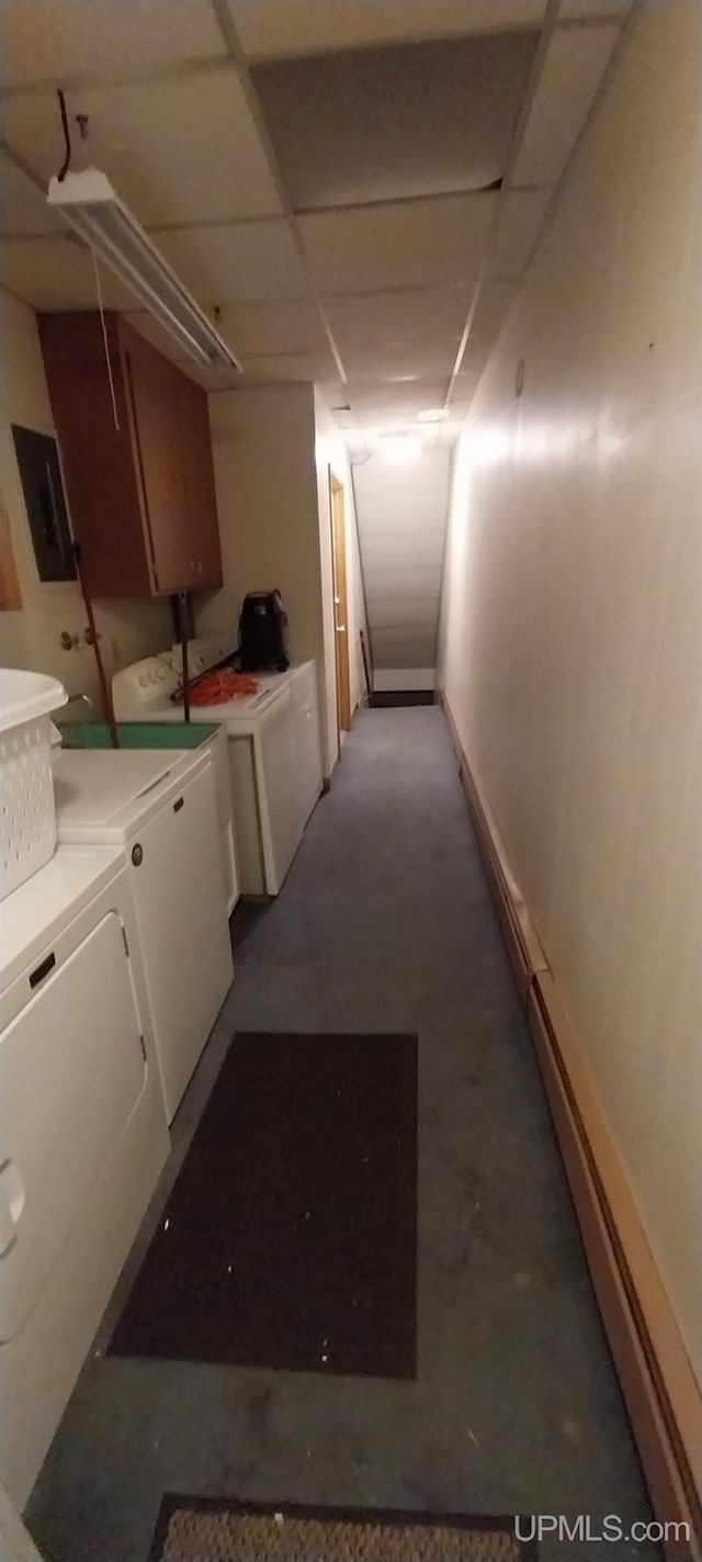 laundry room with cabinets and washing machine and dryer