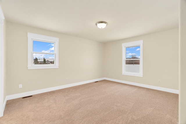 view of carpeted spare room