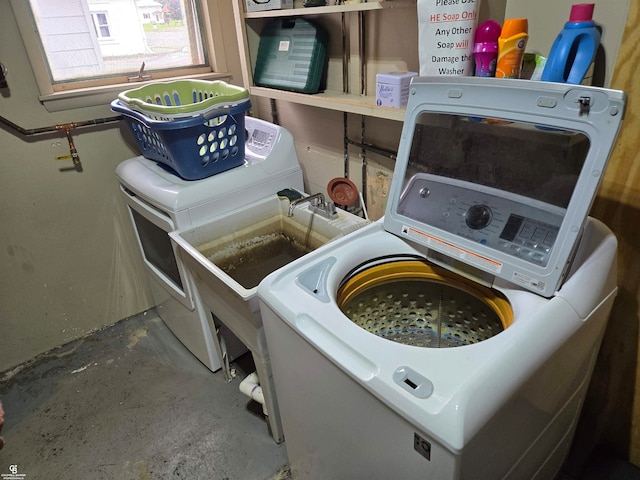 laundry area with independent washer and dryer