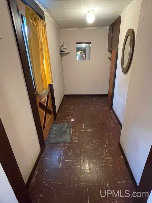 hallway with crown molding