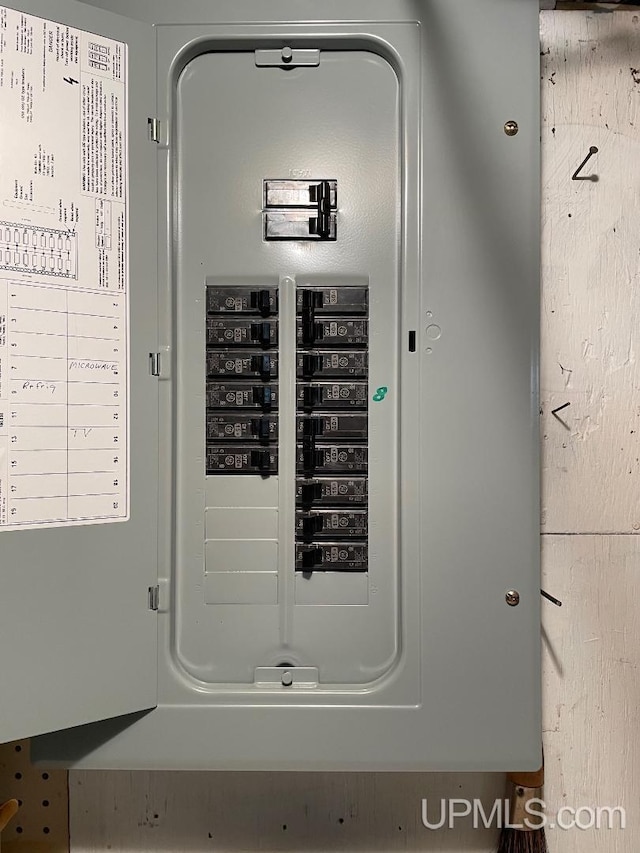 utility room featuring electric panel