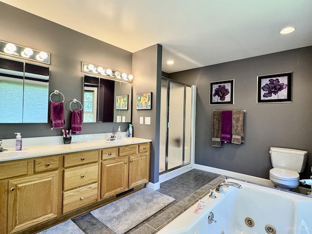 bathroom with a shower stall, a jetted tub, toilet, double vanity, and a sink